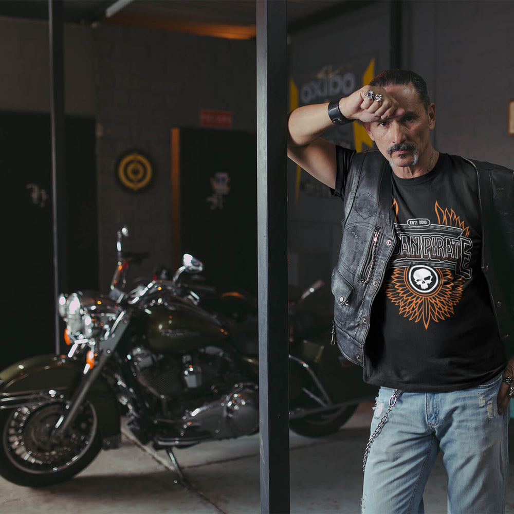 picture-of-a-biker-against-his-chopper-motorcycle-wearing-an-urban-pirate-wings-tshirt-in-black