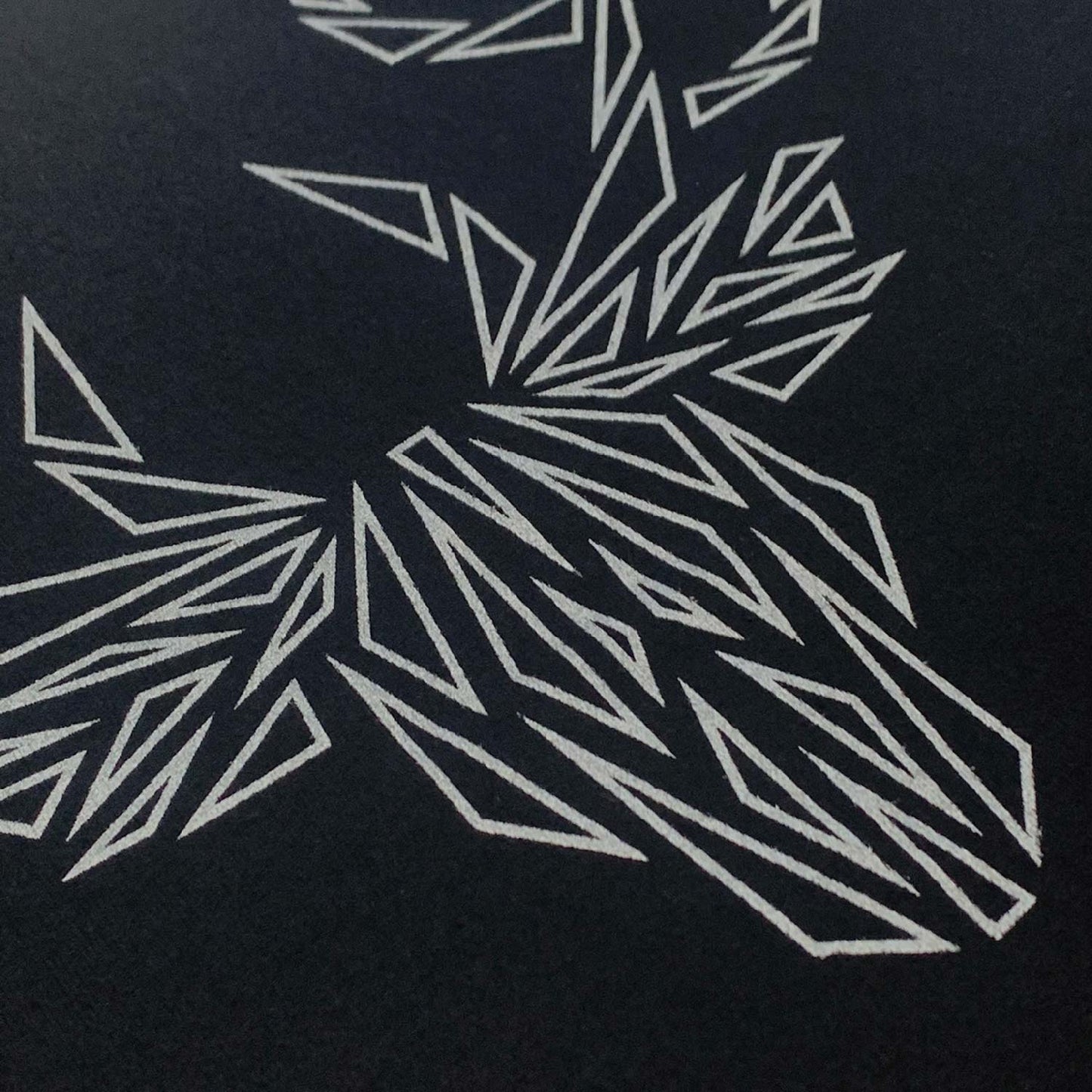 close up of the silver stag design