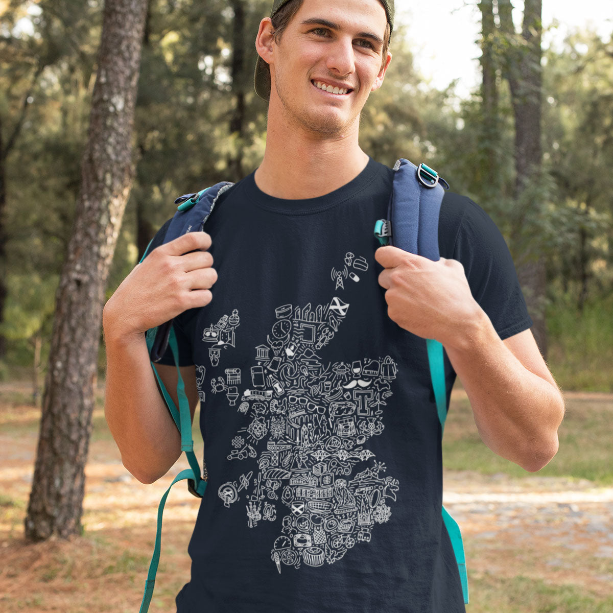 man wearing scottish icons tshirt