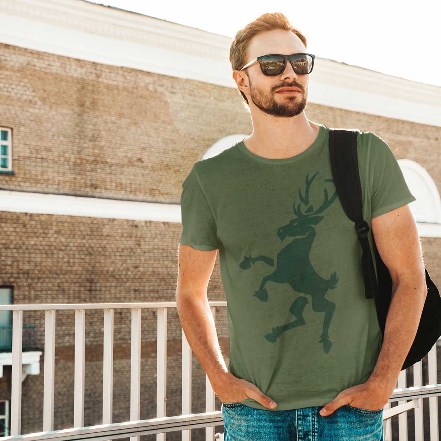 man wearing a stag rampant tshirt
