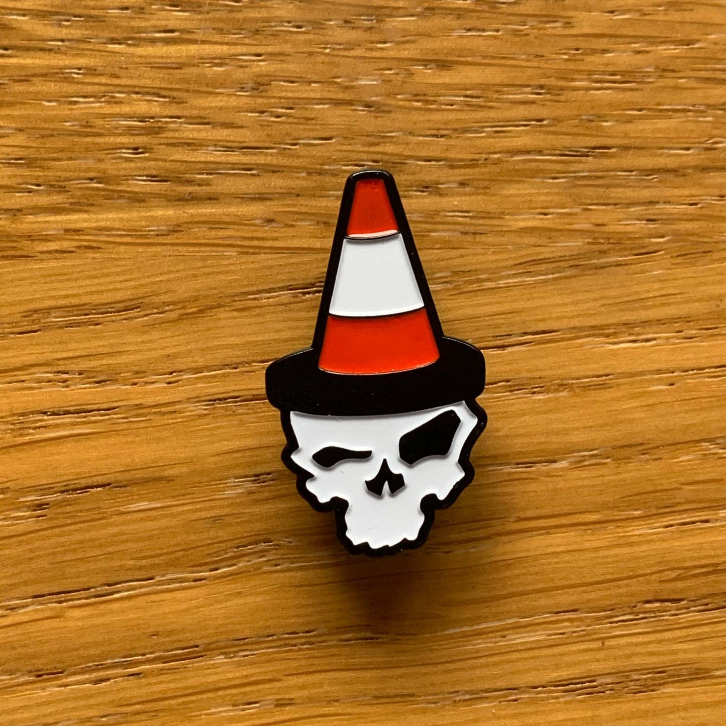 pirate skull with a traffic cone on its head