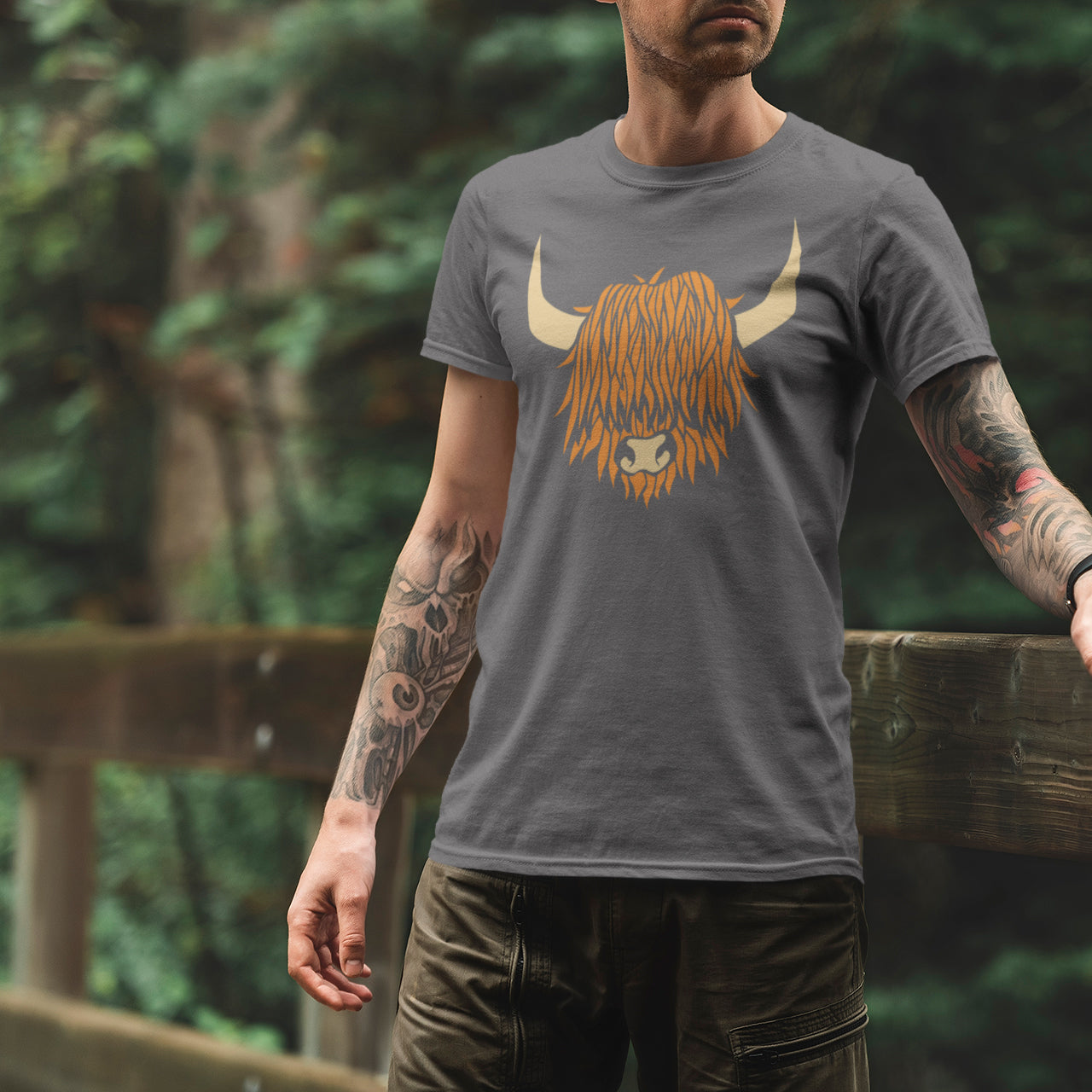 man wearing the ginger highland cow tshirt